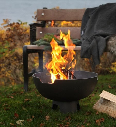 Castworks Hergóm Meteor Low Base Fire Pit, outdoor fireplace with a sleek low design and modern metal finish.