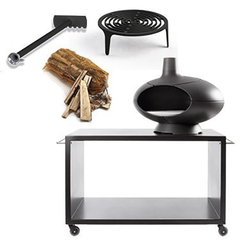 Morsø Forno outdoor oven garden set with ceramic pizza stone, cooking tools, and durable oven exterior in a garden setting.