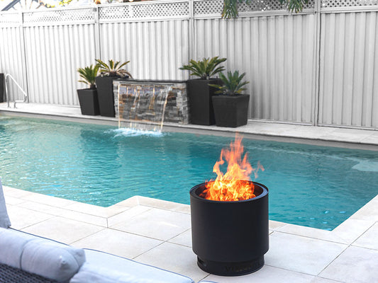 VisionLINE outdoor firepit made of stainless steel, designed for outdoor fireplaces and perfect for outdoor gathering spaces.
